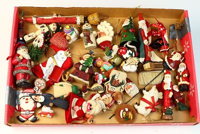 A Collection of Assorted Santa Claus and Holiday Themed Christmas Ornaments. This lot contains 