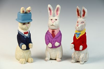 A Trio of Hand-Carved and Painted Wood Anthropomorphic Rabbit Figurines. A set of three 