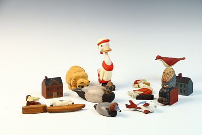A Group of American Folk Art Hand-Carved and Painted Wooden Figurines. This collection consists 