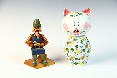 Two Decorative Figurative Items Including an Italian Ceramic Pig Bank and a German Wooden 