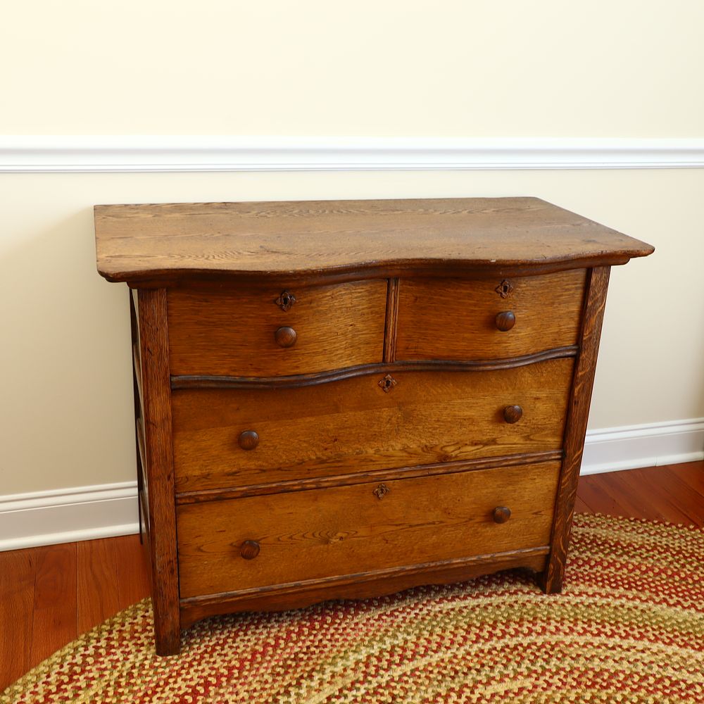 Lot 163: Late 19th Century American Oak Serpentine Front Chest of Drawers