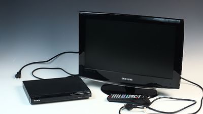 Samsung 19 Inch LCD HDTV and Sony DVD Player with Remote. This lot contains a Samsung LCD 