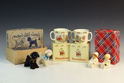 A Collection of Vintage Children's Ceramic Mugs and Figurines Including Royal Doulton Bunnykins. 