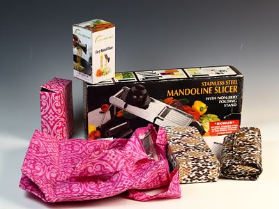 An Assortment of Kitchen Food Preparation Tools and Patterned Storage Accessories. This lot 