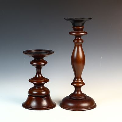 A Pair of Pottery Barn Graduated Turned Wood Candlesticks. This lot consists of a pair of 