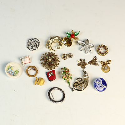 A Collection of 18 Vintage Costume Jewelry Brooches and Pins Including Trifari, Coro, and Sarah 