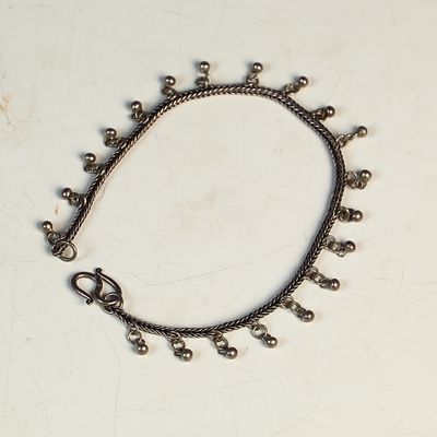 Sterling Silver Braided Chain Anklet with Ball Drop Charms. A sterling silver anklet featuring a 