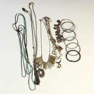 An Assortment of Boho Style Fashion Costume Jewelry Necklaces and Bracelets. A collection of 