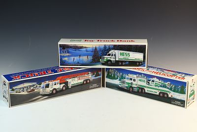 Three Amerada Hess Corporation Promotional Toy Vehicles in Original Boxes. A collection of three 