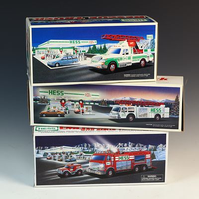Three Vintage Hess Toy Trucks in Original Packaging. This lot consists of three vintage toy 