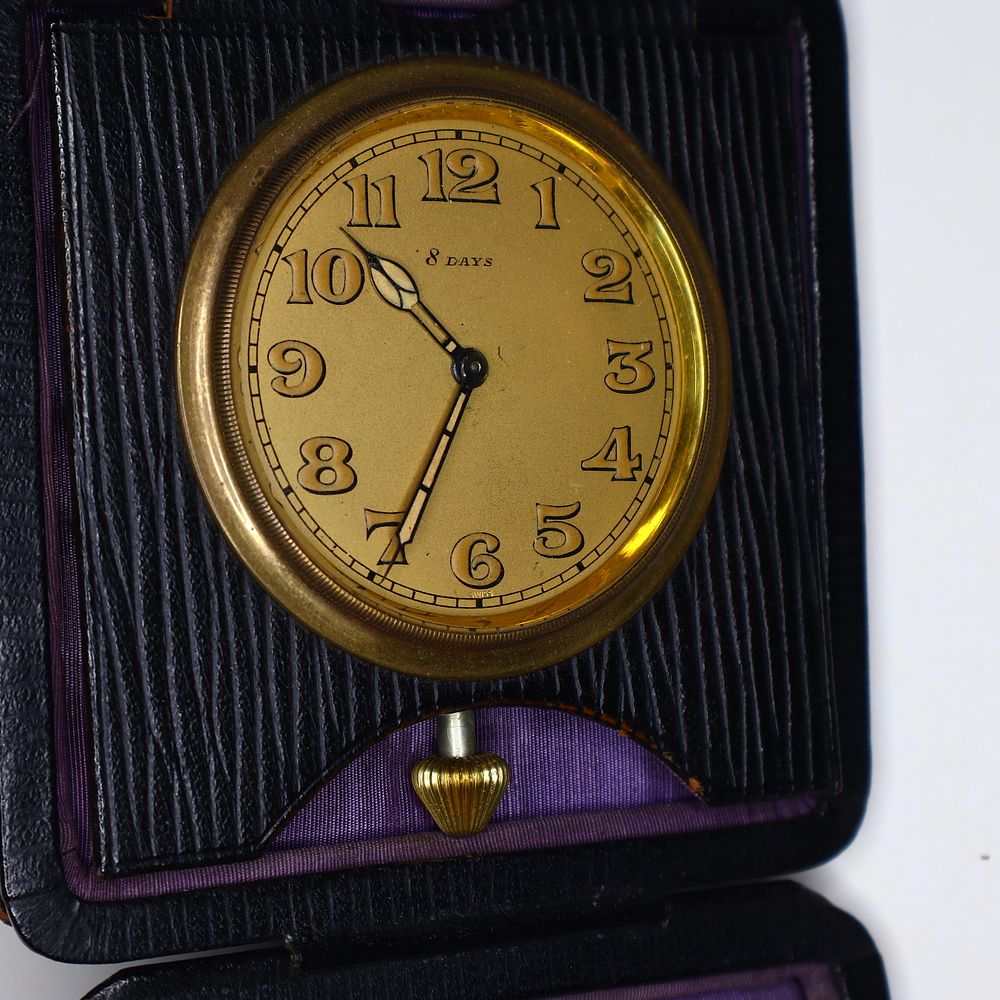 Lot 156: Vintage Swiss 8-Day Manual Wind Folding Leather Travel Clock