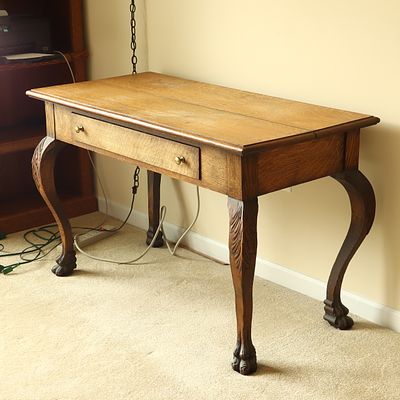 American Quartersawn Oak Chippendale Style Writing Desk. A quartersawn oak writing desk in the 