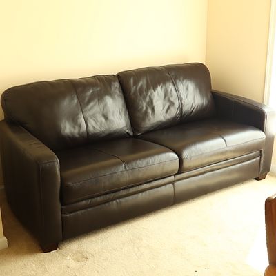 Contemporary Chocolate Brown Leather Sleeper Sofa with Contrast Stitching. A contemporary 