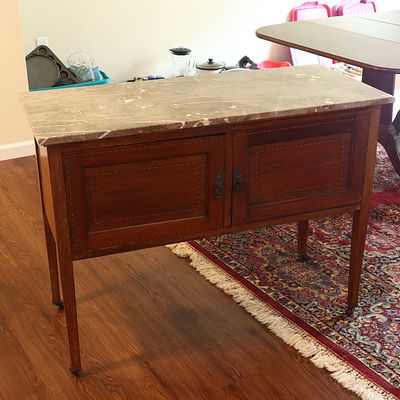 Mahogany Marble-Top Inlaid Server with Casters. This mahogany server is topped with a heavy 