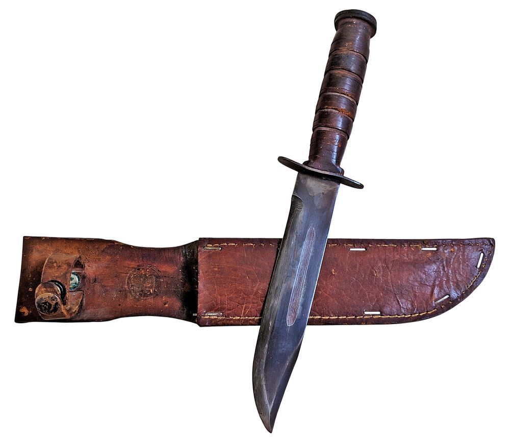 סכין פלסים - הנדן עשוי עור, עם חותמת האות 'צ' (צה"ל נשחקה מעט). הסכין מתוצרת KIFFE יפן, הגארד 