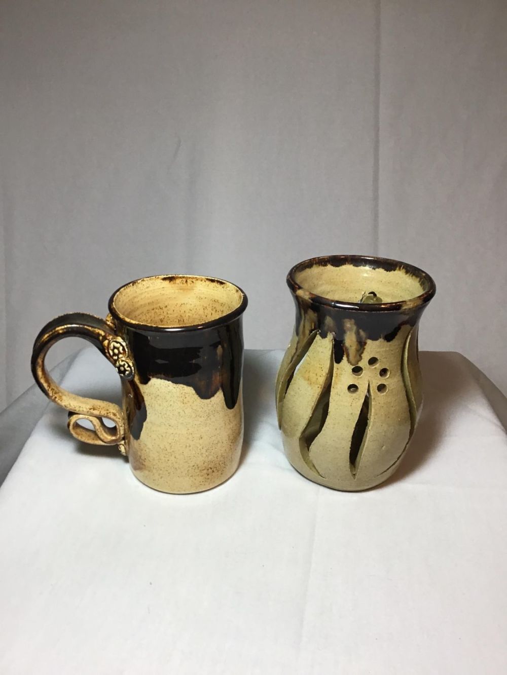 Lot 164: Ceramic candleholder and mug 6?Â tall