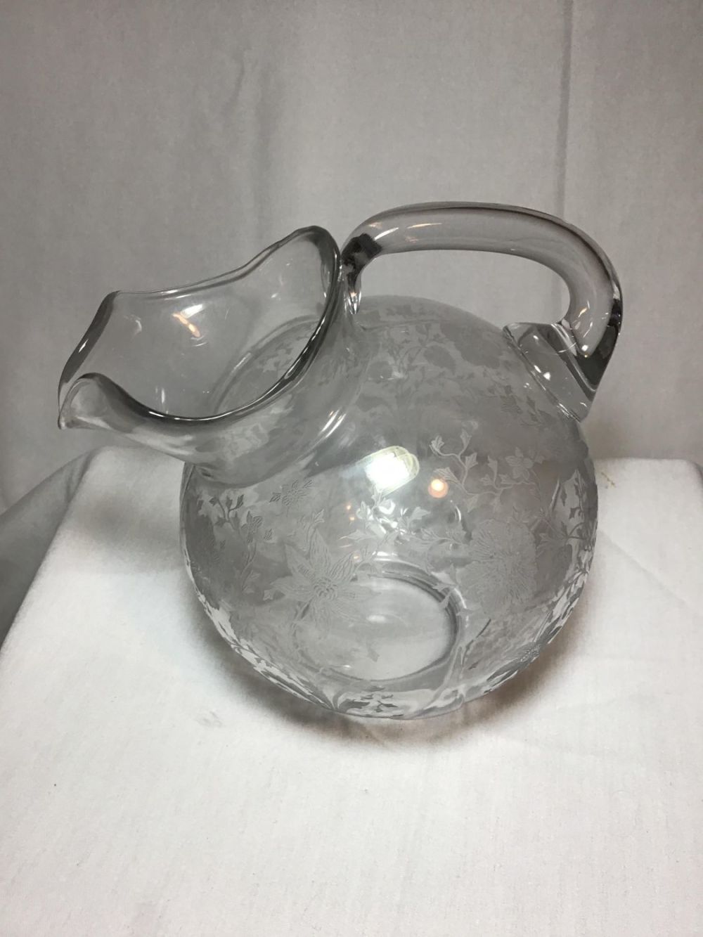 Lot 175: Floral etched pitcher Unique and beautiful pitcher