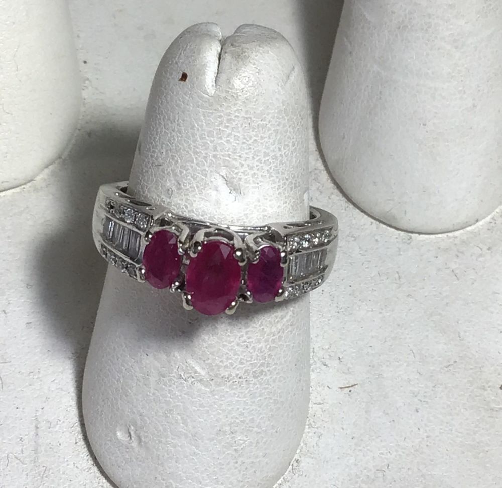 Lot 180: Red Ruby & 14kt Gold  Ring Diamond accents on both