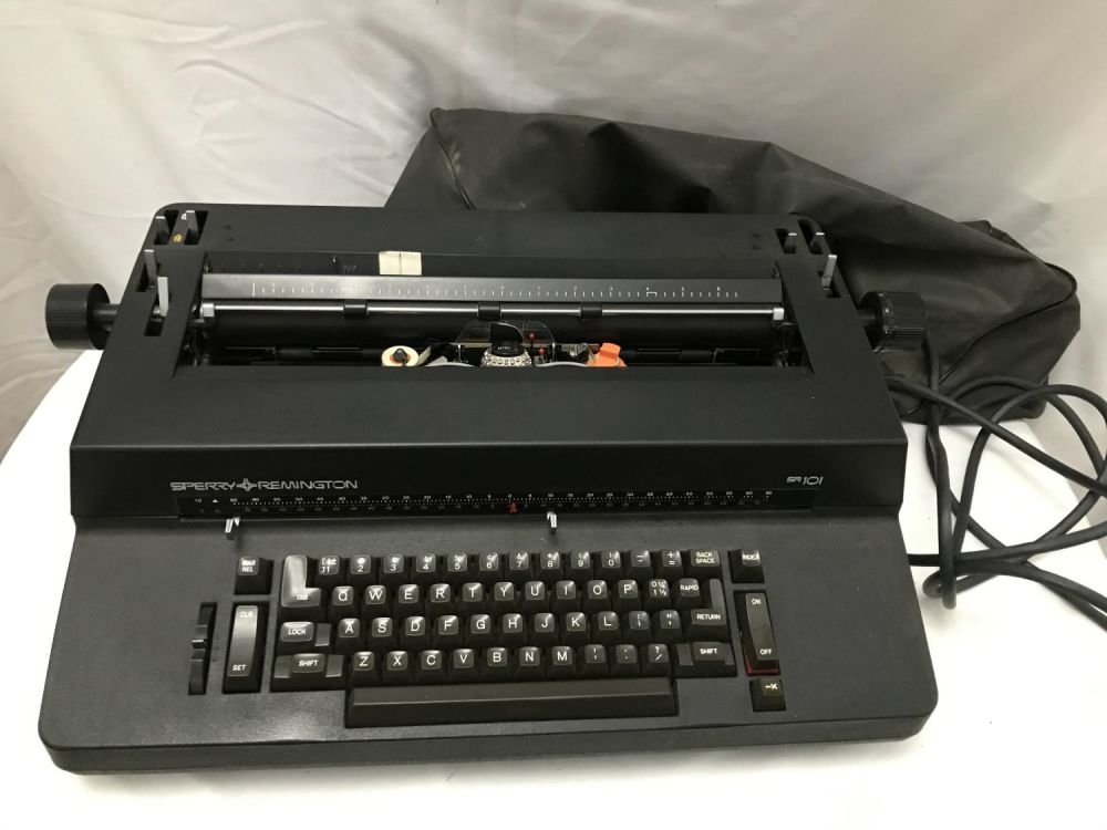 Lot 210: Remington SR101 Type Writer w Cover .