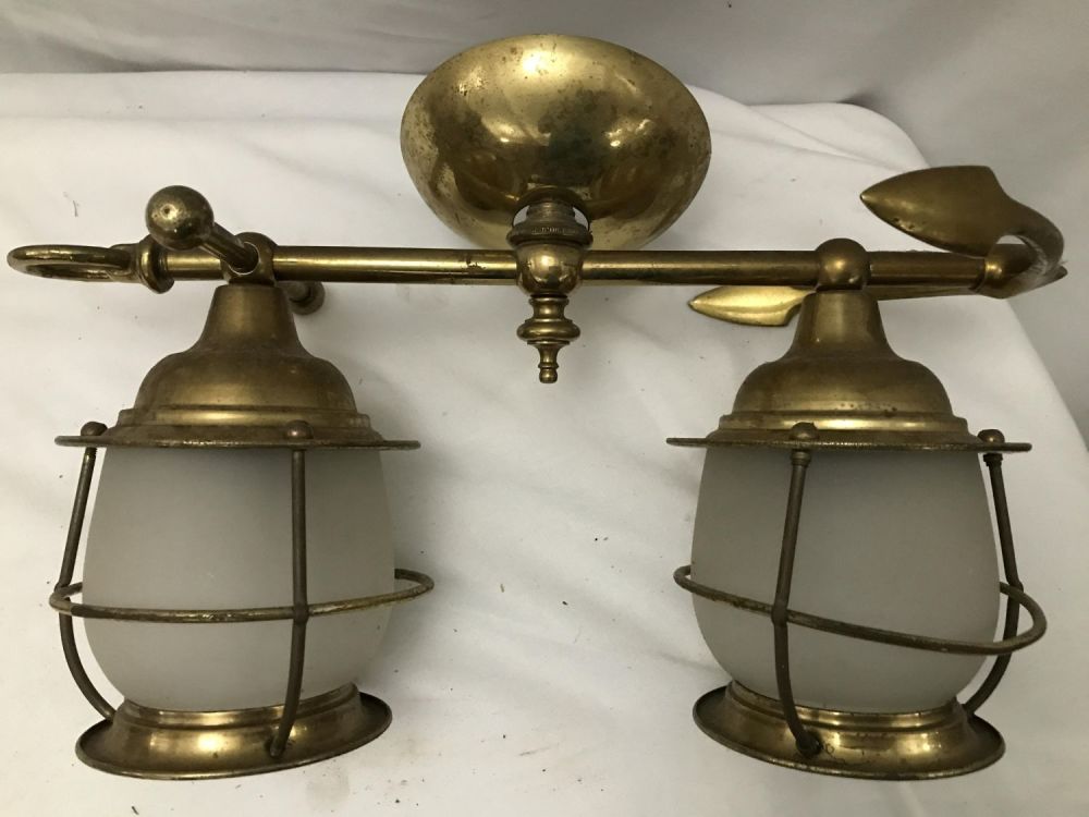 Lot 218: Brass Anchor Light Fixture .