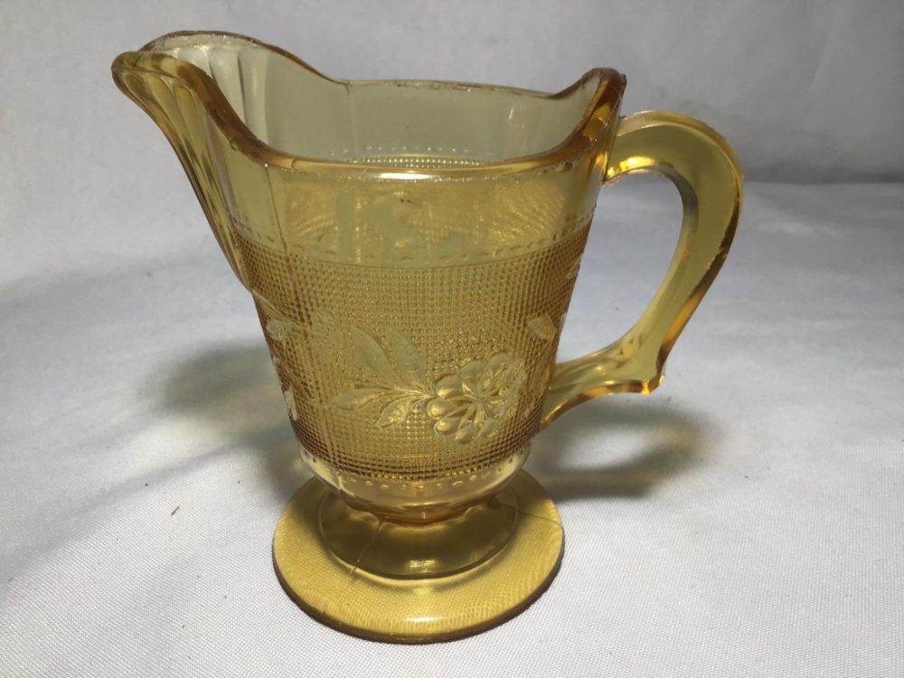 Lot 151: Miniature Yellow Depression Glass Pitcher 5in    tall