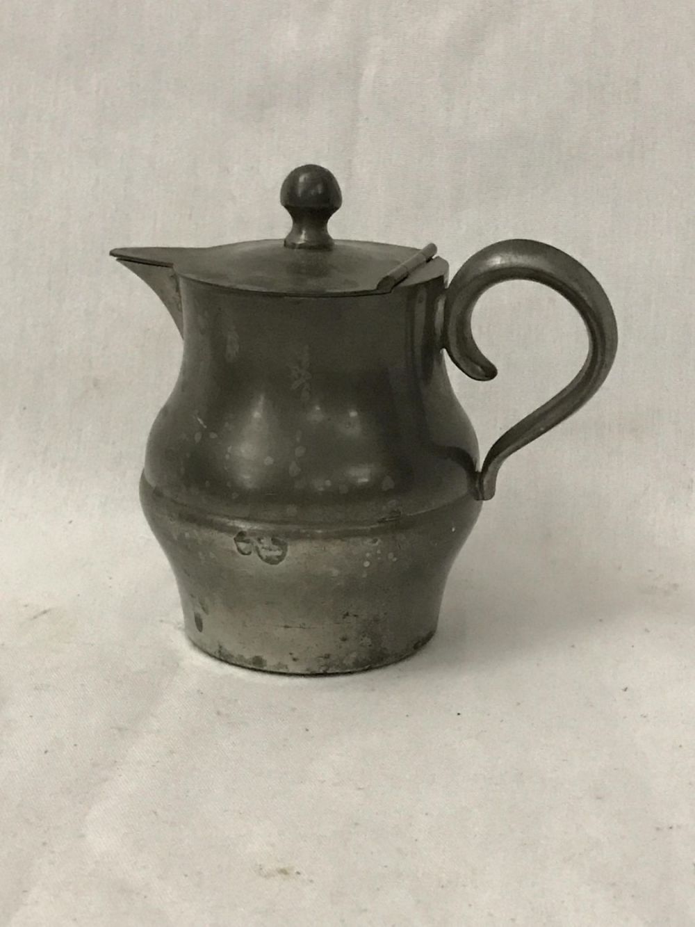 Lot 174: Vintage Pewter Creamer Measures 4.25 inches tall
