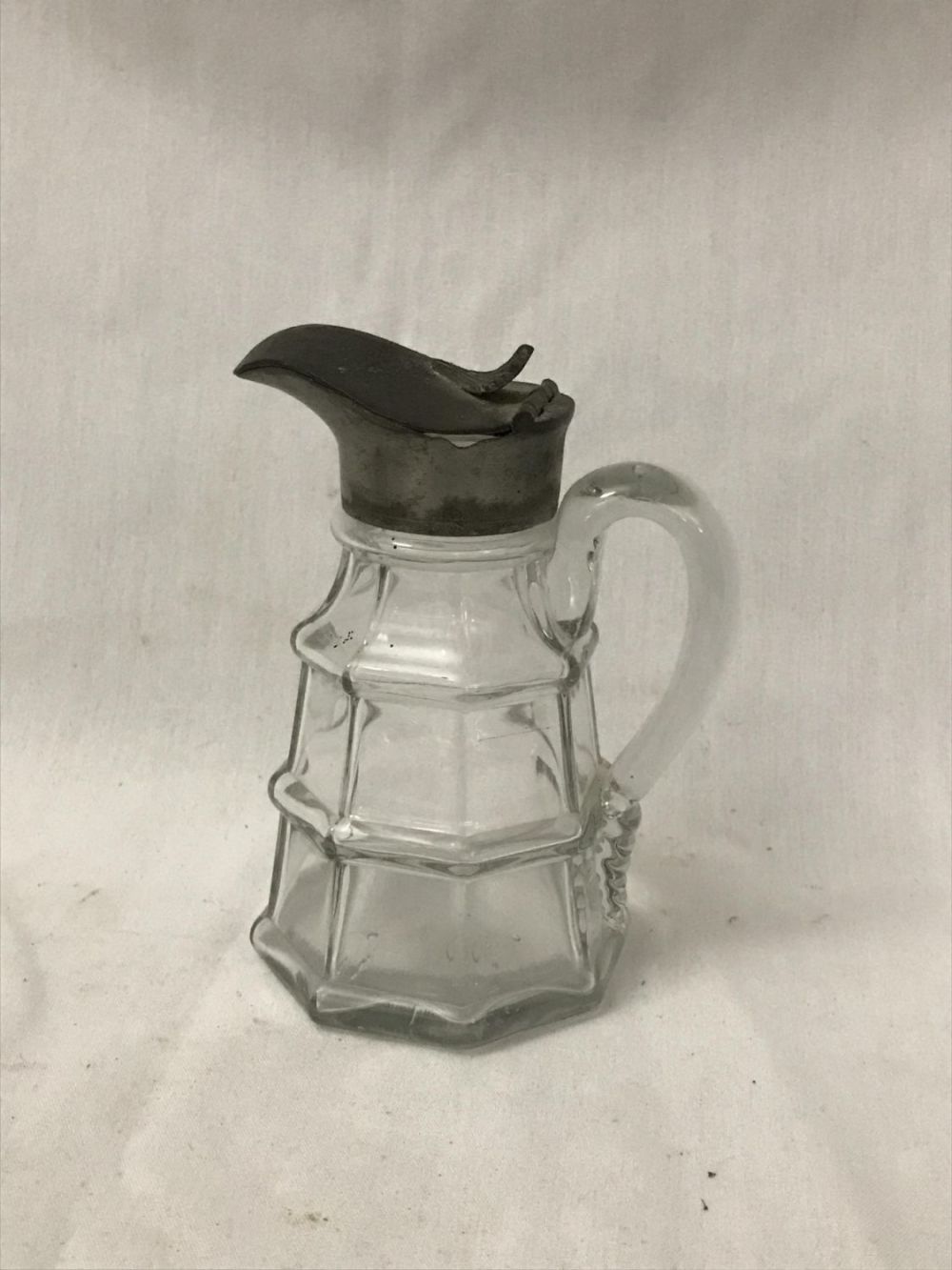 Lot 176: Elegant Syrup Pourer Measures 6 inches tall