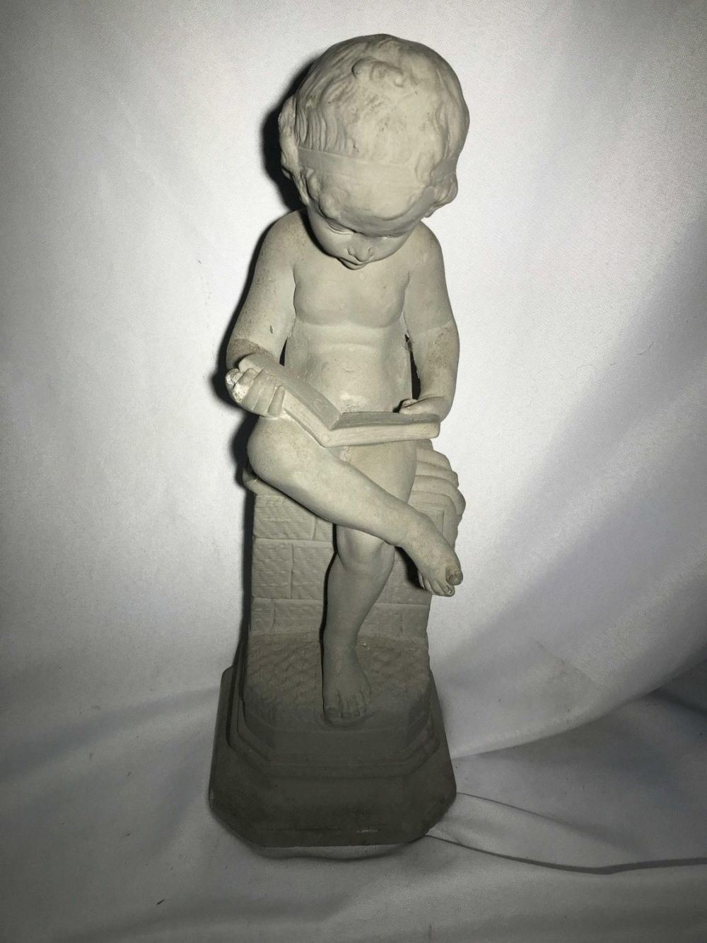 Lot 207: Reading Child Statue Solid concrete