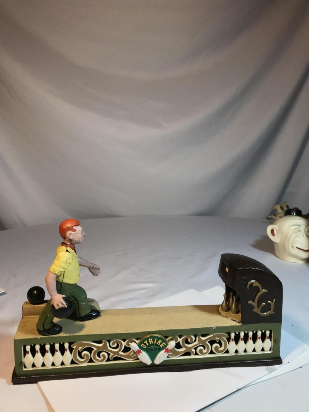 Lot 153: Mechanical Cast Iron Strike Bank 11 1/2 by 6