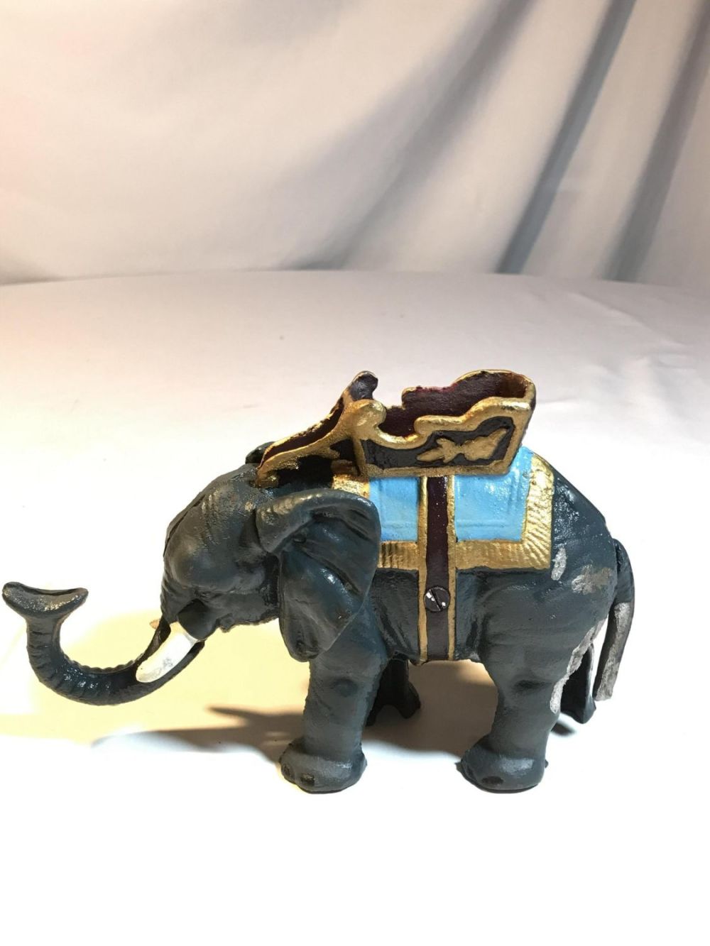Lot 158: Elephant with moving trunk bank, Cast Iron Approximately 8 by 5