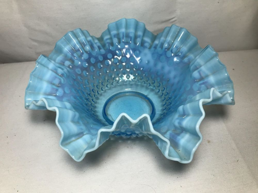 Lot 253: Ribbon Glass Centerpiece Measures 11 inches wide by 4.5 inches tall