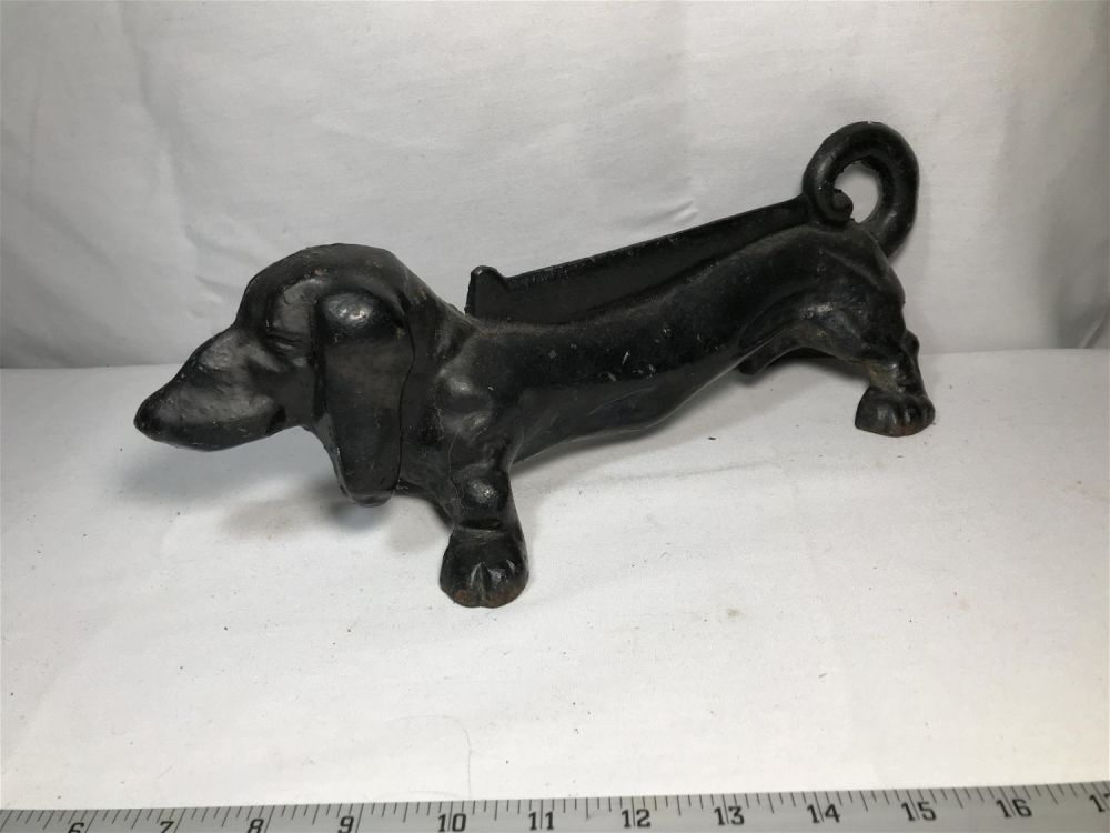 Lot 255: Early Cast Iron Wiener Dog Boot Scrapper Measures 15 x 6 inches