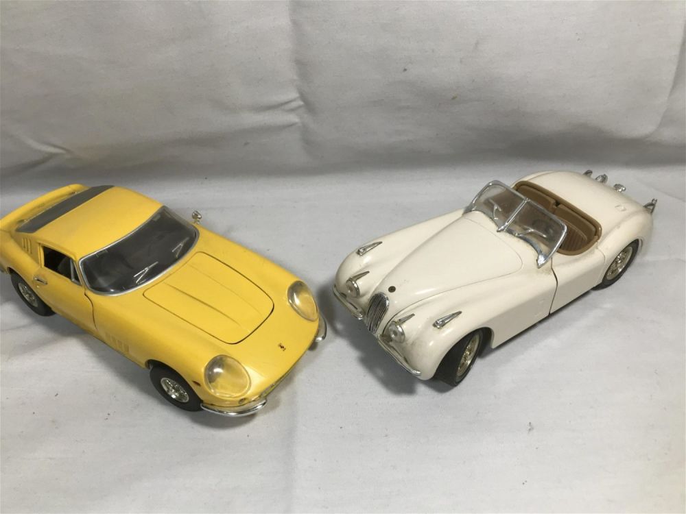 Lot 268: ERTL Classic Cars 1948 Jaguar and Ferrari Each measures approximately 10 inches long