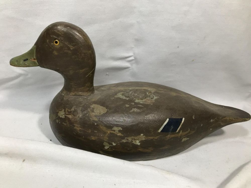 Lot 285: Folk Art Duck Decoy- Glass Eye Measures 1 foot long