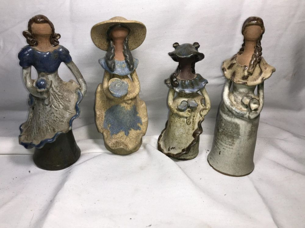 Lot 295: Dominican Republic Red Clay Figures Each measures approximately 9 inches tall
