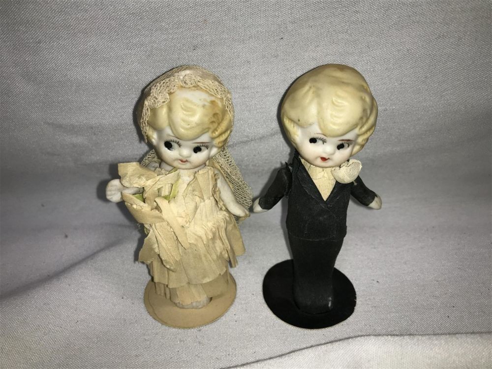 Lot 297: Kewpie Bride and Groom Each measures 4 inches tall