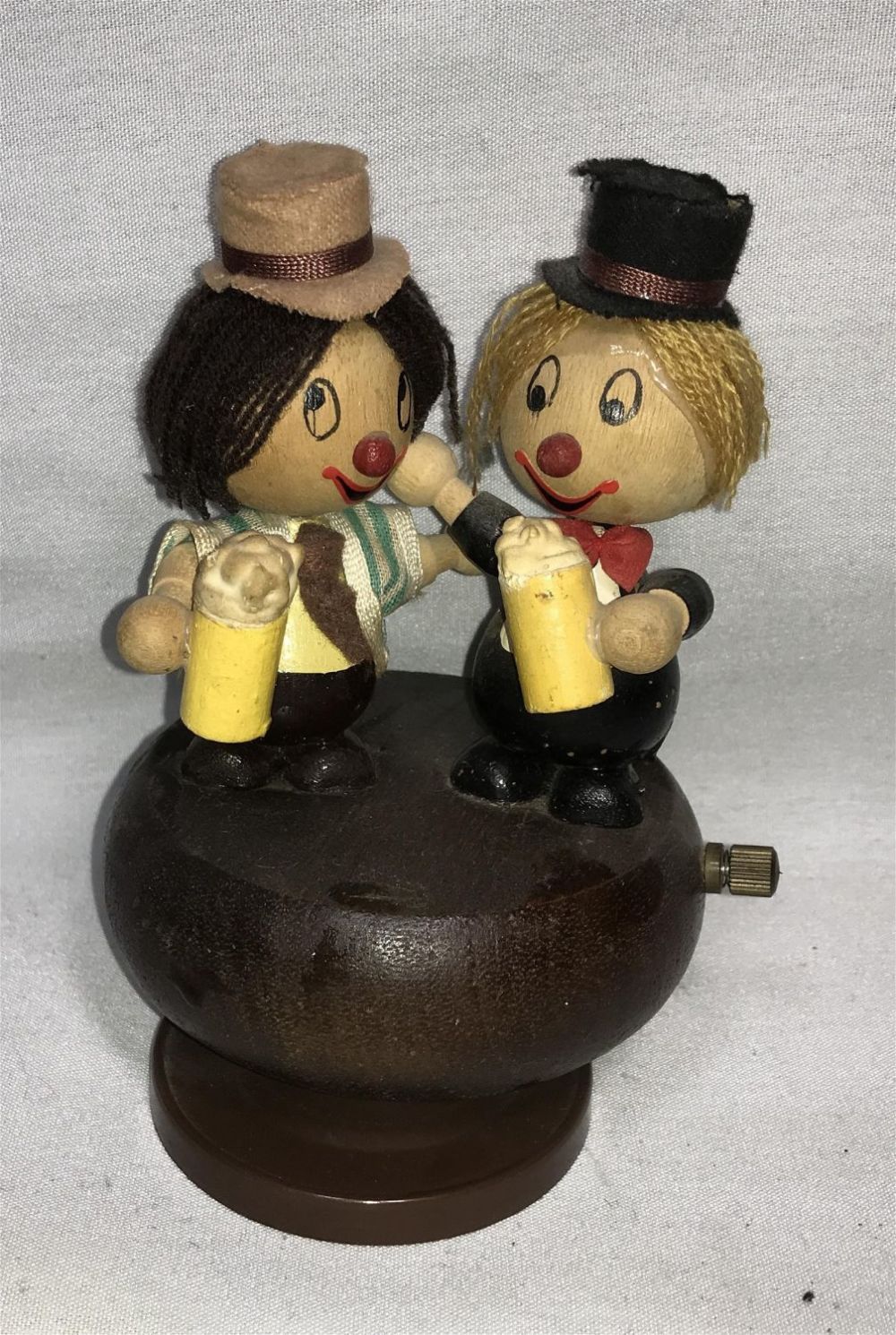 Lot 302: Vintage Drinking Buddies Music Box Measures 6 Inches tall Beer foam on one side has been repaired