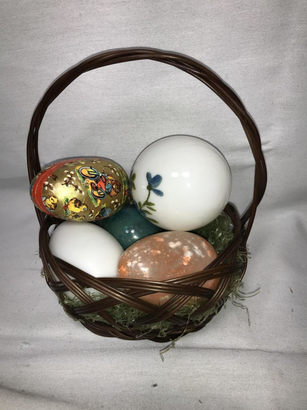 Lot 303: Vintage Easter Egg Basket Collection Measures 7 inches tall by 7 inches wide