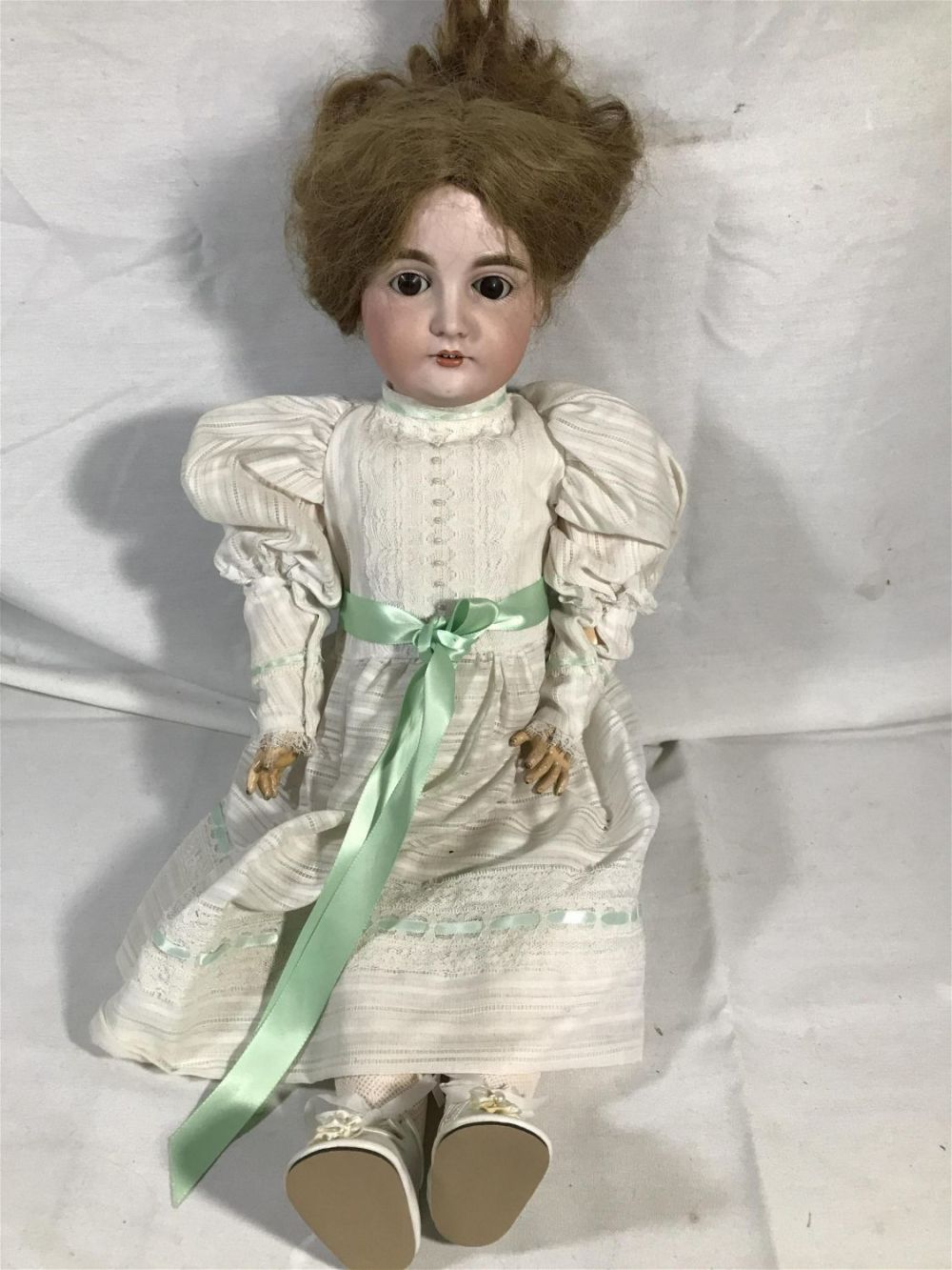 Lot 157: German porcelain Doll with Teeth & eyes #164 .