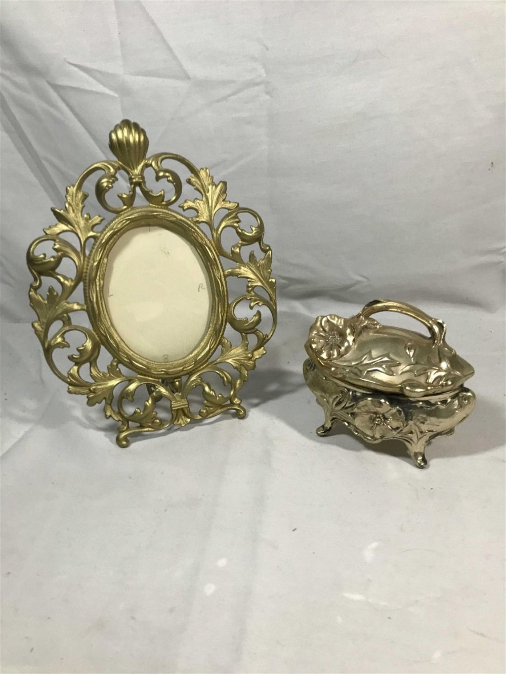 Lot 166: Early vanity mirror and Victorian jewelry box .