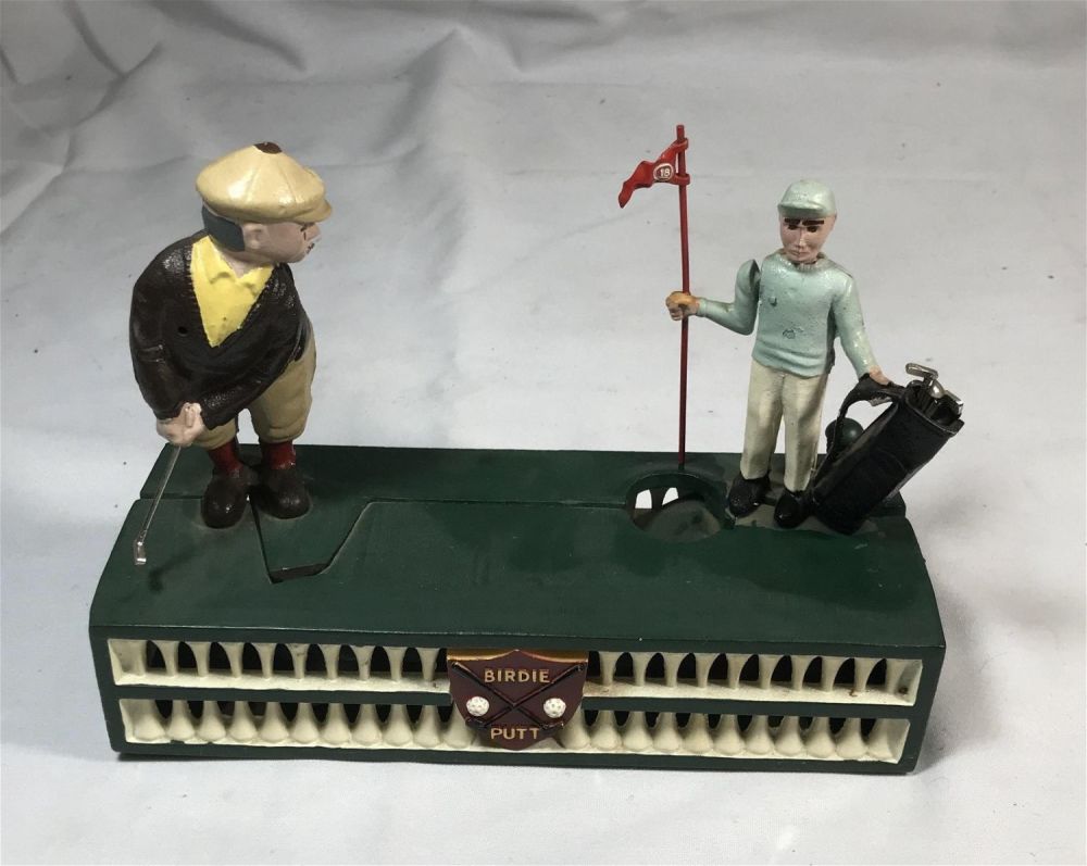 Lot 181: Mechanical cast-iron birdie putt golfing bank, height 7 inches length 9 inches depth 3 1/2 inches