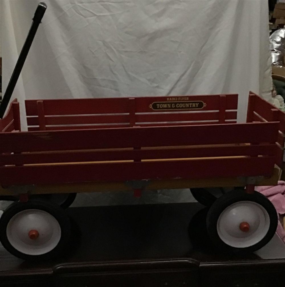 Lot 202: Vintage town and country radio flyer wagon .