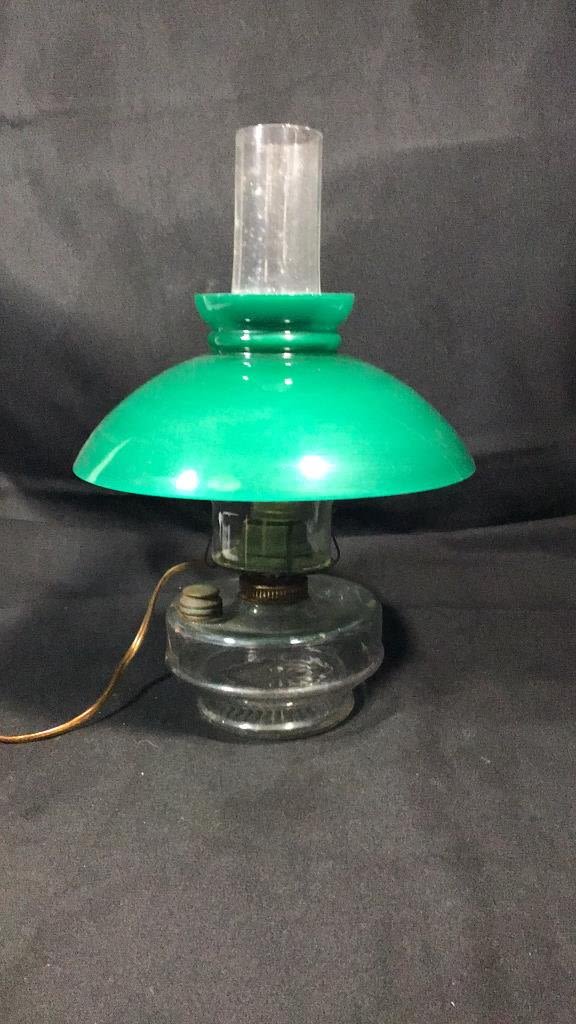 Lot 221: Vintage Cradle Oil Lamp converted by Eagle Company