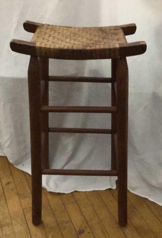 Lot 229: Woven Cane Stool .