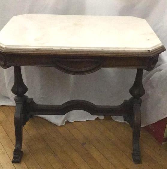 Lot 230: Antique Marble Top Victorian Hall Table measures H 27 x L 31 x D22