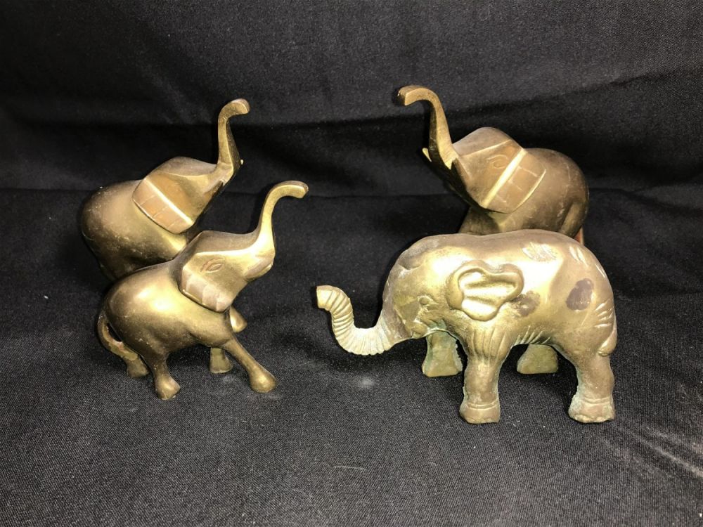 Lot 244: Elephant Collection Each measures approximately 4 inches tall