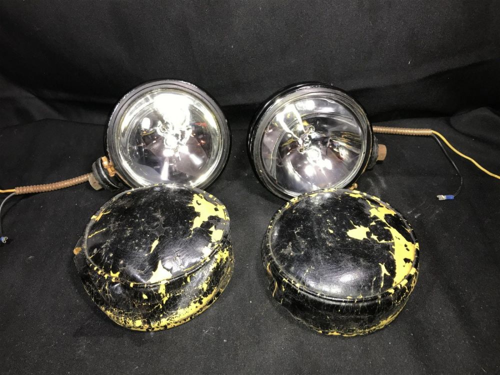 Lot 247: Early KC Headlights with Covers .