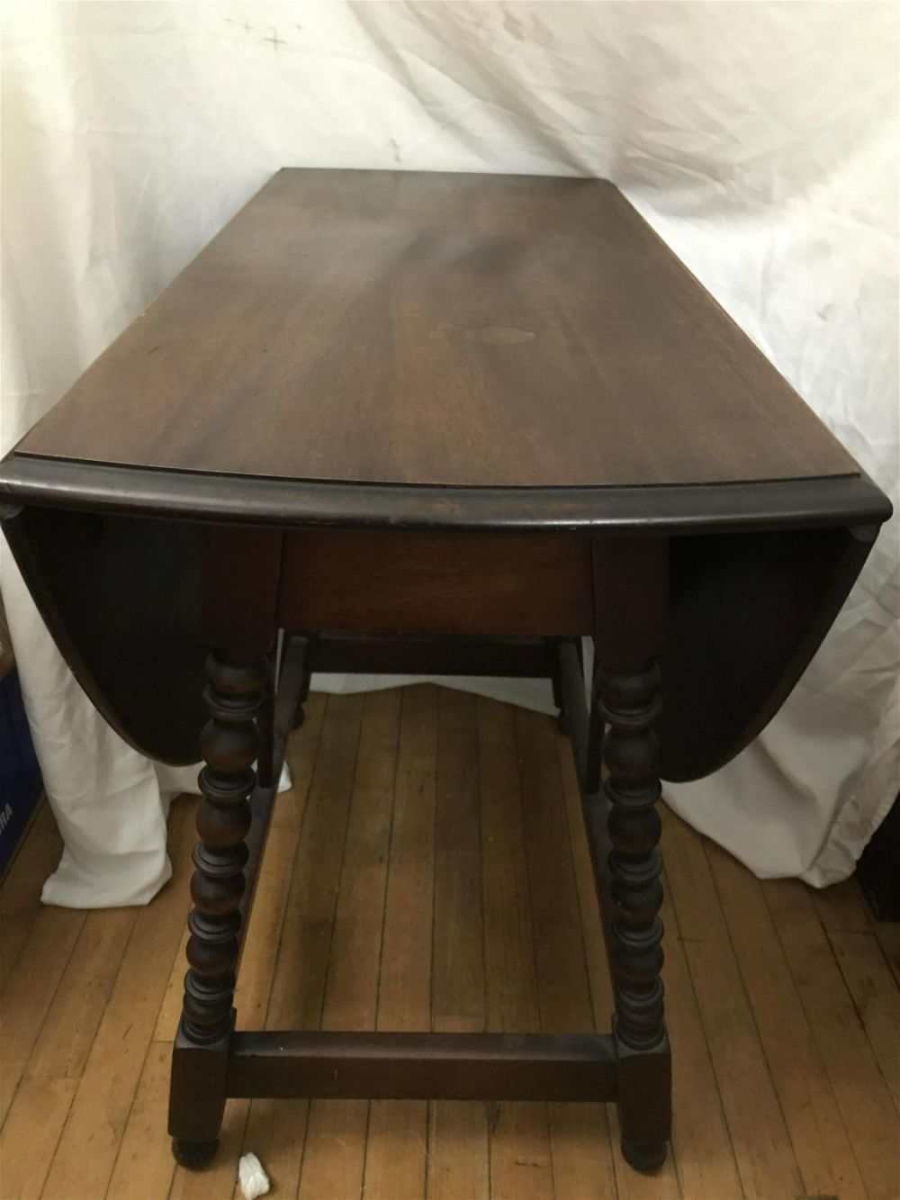 Lot 249: Vintage Maddox Dropleaf Table Measures 29 inches tall by 36 inches wide