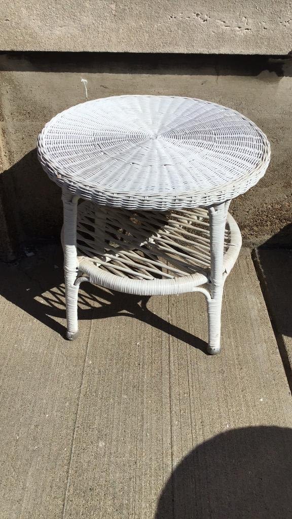 Lot 261: Wicker End Table measures 19 inches tall by 20 inches diameter