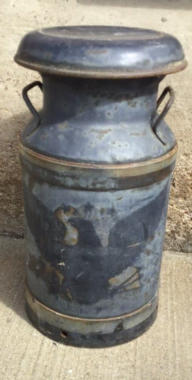 Lot 264: Scott Powell Diaries Milk Jug measures 20 inches tall